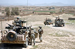 Afghan Forces Battle to Win Back District Center